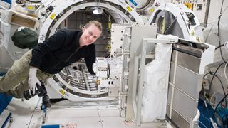 The Nanoracks Bishop airlock module that is being added to the space station has five times the capacity of the Japanese Experiment Module Airlock (JEMAL), shown here with NASA astronaut Kate Rubins.