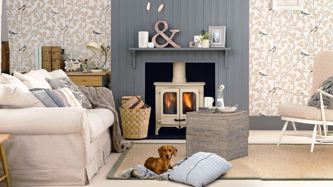 heating systems Neutral living room with grey tongue and groove chimney breast, shelf with oversized &#039;&amp;&#039; symbol, wood burner, fireplace