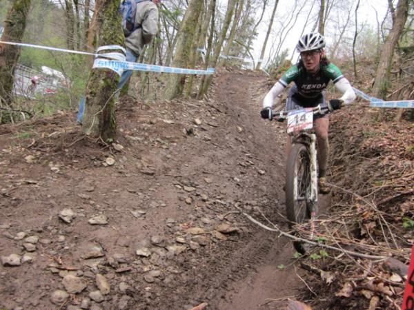 Mary McConneloug uses some body english to descend in Houffalize.
