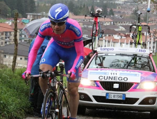 Damiano Cunego (Lampre-ISD) on a climb barely wide enough for his team car to negotiate.