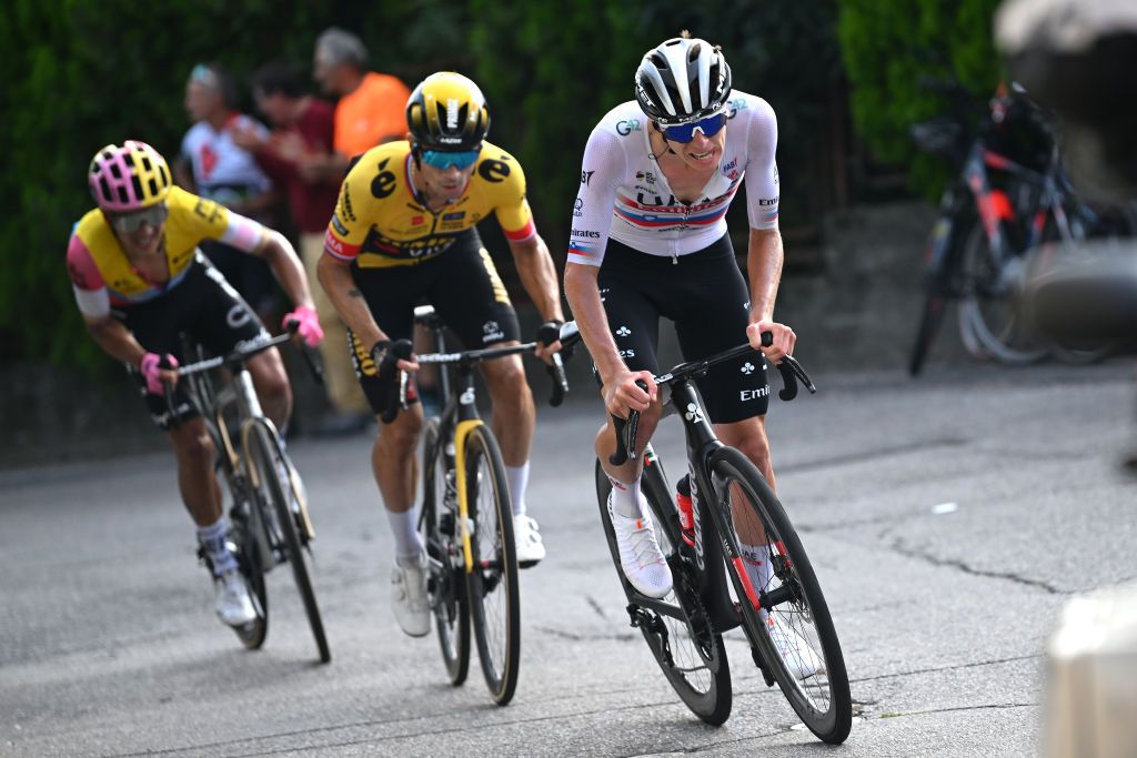 VARESE ITALY OCTOBER 03 LR Richard Carapaz of Ecuador and EF EducationEasyPost Primoz Roglic of Slovenia and Team JumboVisma and Tadej Pogacar of Slovenia and UAE Team Emirates attack in the chase group during the 102nd Tre Valli Varesine 2023 a 19654km one day race from Busto Arsizio to Varese on October 03 2023 in Varese Italy Photo by Dario BelingheriGetty Images