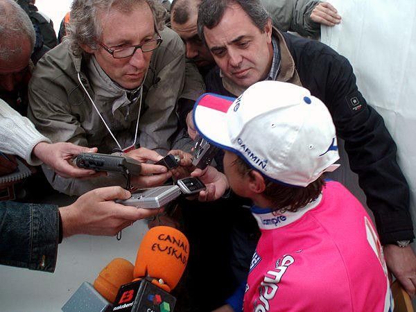 Italian Damiano Cunego (Lampre) gets swamped by the media after winning the fifth stage.