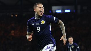 Lyndon Dykes of Scotland celebrates scoring ahead of the Euro 2024 Qualifying round