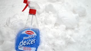 De-icer bottle in the snow