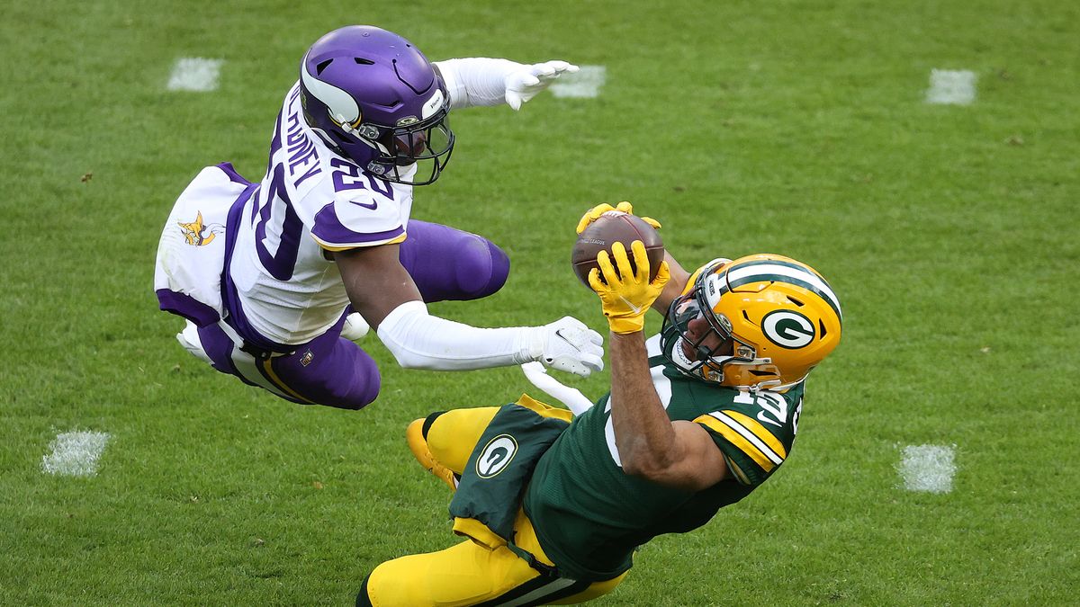 Equanimeous St. Brown #19 of the Green Bay Packers with a failed catch attempt as Jeff Gladney #20 of the Minnesota Vikings defends during the fourth quarter at Lambeau Field on Nov. 1, 2020 in Green Bay, Wisconsin.