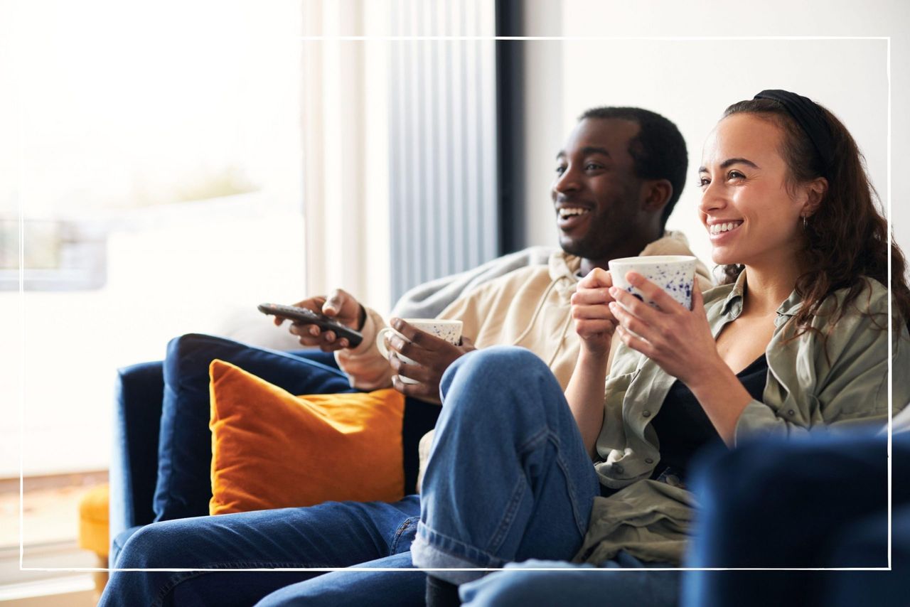 Couple on the sofa watching their TV