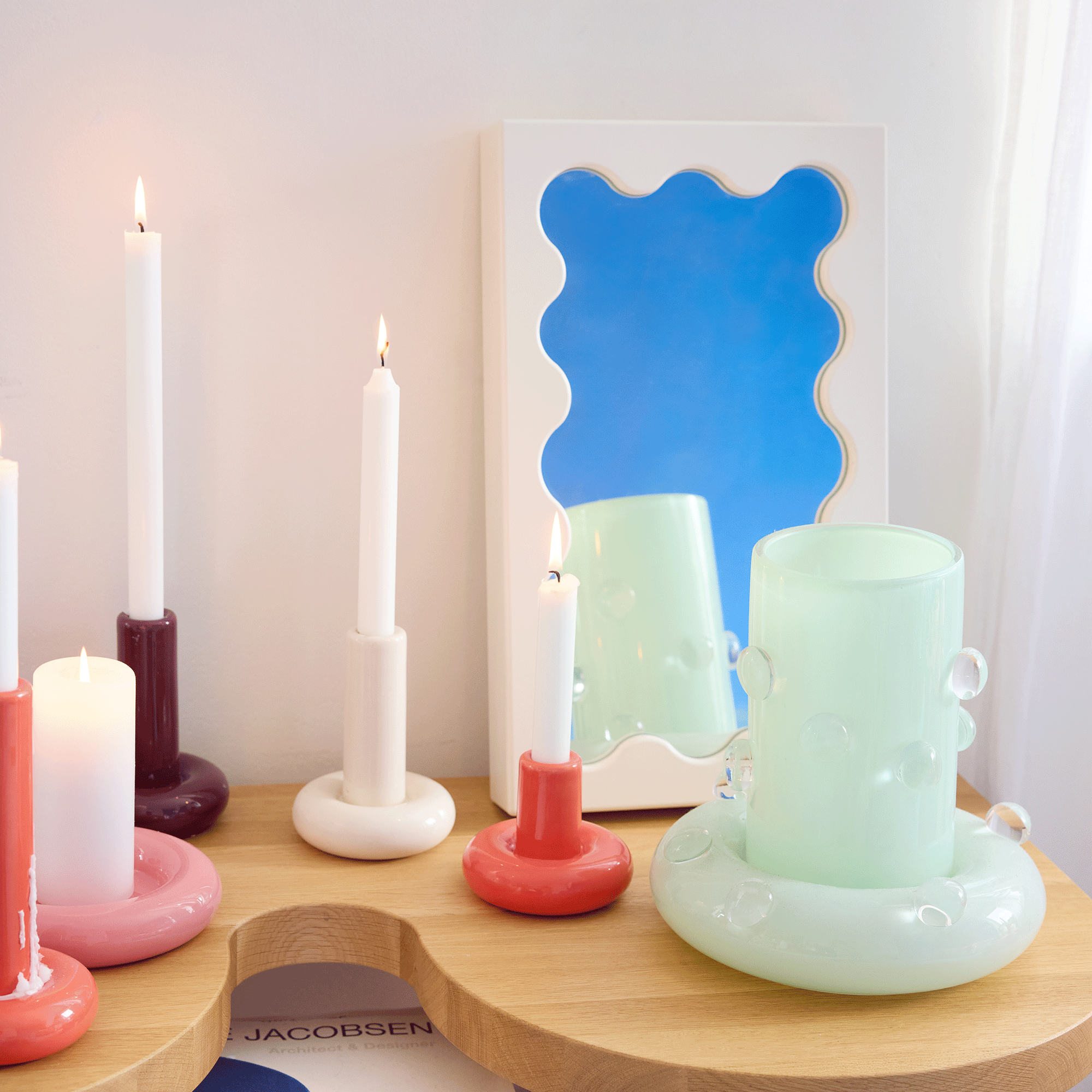 Gustaf Westman studio apartment white walls with mirror decor and candles