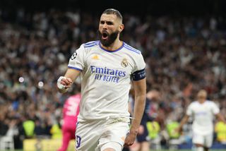 Karim Benzema of Real Madrid celebrates after scoring their side's third goal during the UEFA Champions League Semi Final Leg Two match between Real Madrid and Manchester City at Estadio Santiago Bernabeu on May 04, 2022 in Madrid, Spain.