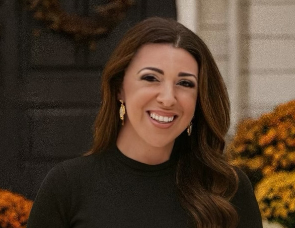 woman with long hair smiling