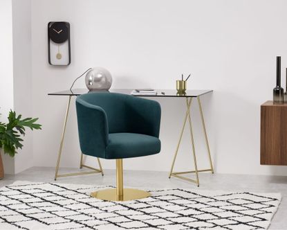 MADE.com Revy Office Chair in blue velvet inside white home office with Berber rug and brass desk