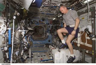 Williams on ISS bike in 2006