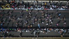 Birds-eye view of crowds running London Marathon
