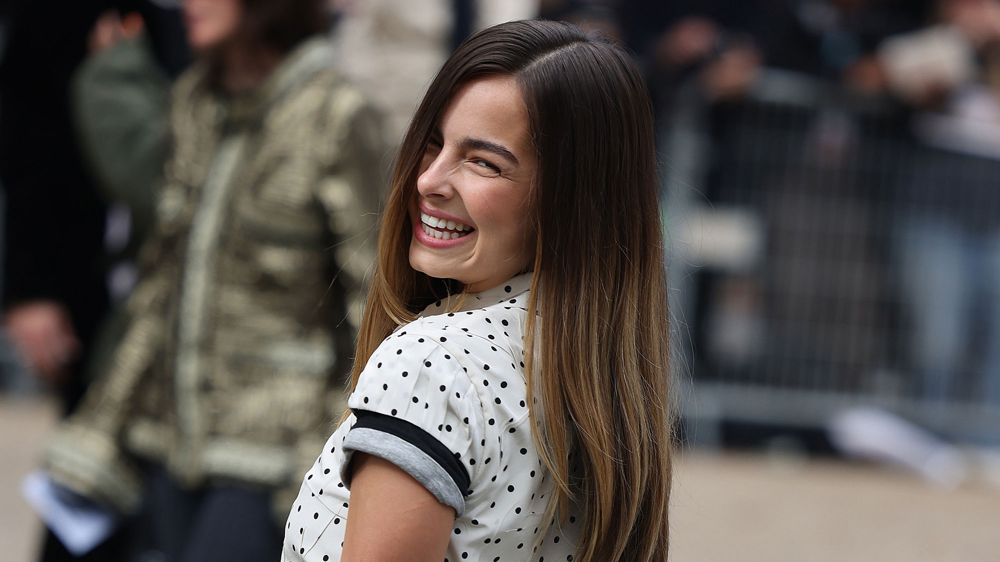 Addison Rae is photographed at the Miu Miu show