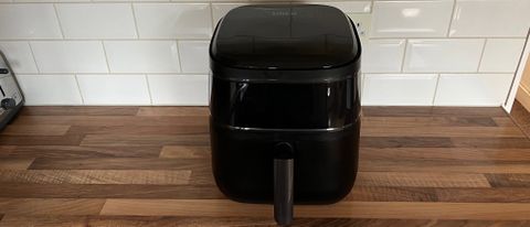 The Dreo 6-Quart Air Fryer on a kitchen countertop