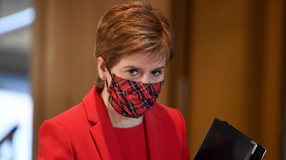 Nicola Sturgeon attends a debate at the Scottish Parliament