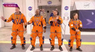The Artemis 2 astronauts walk out ahead of their planned launch on April 1, 2026.