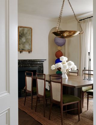 dining room with forest green seat cushions