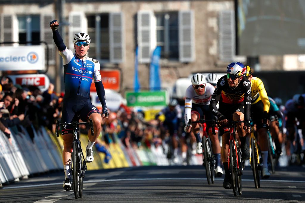 ORLEANS FRANCE MARCH 07 Fabio Jakobsen of Netherlands and Team QuickStep Alpha Vinyl celebrates winning ahead of Wout Van Aert of Belgium and Team Jumbo Visma and Christophe Laporte of France and Team Jumbo Visma yellow leader jersey during the 80th Paris Nice 2022 Stage 2 a 1592km stage from Auffargis to Orlans ParisNice on March 07 2022 in Orleans France Photo by Bas CzerwinskiGetty Images