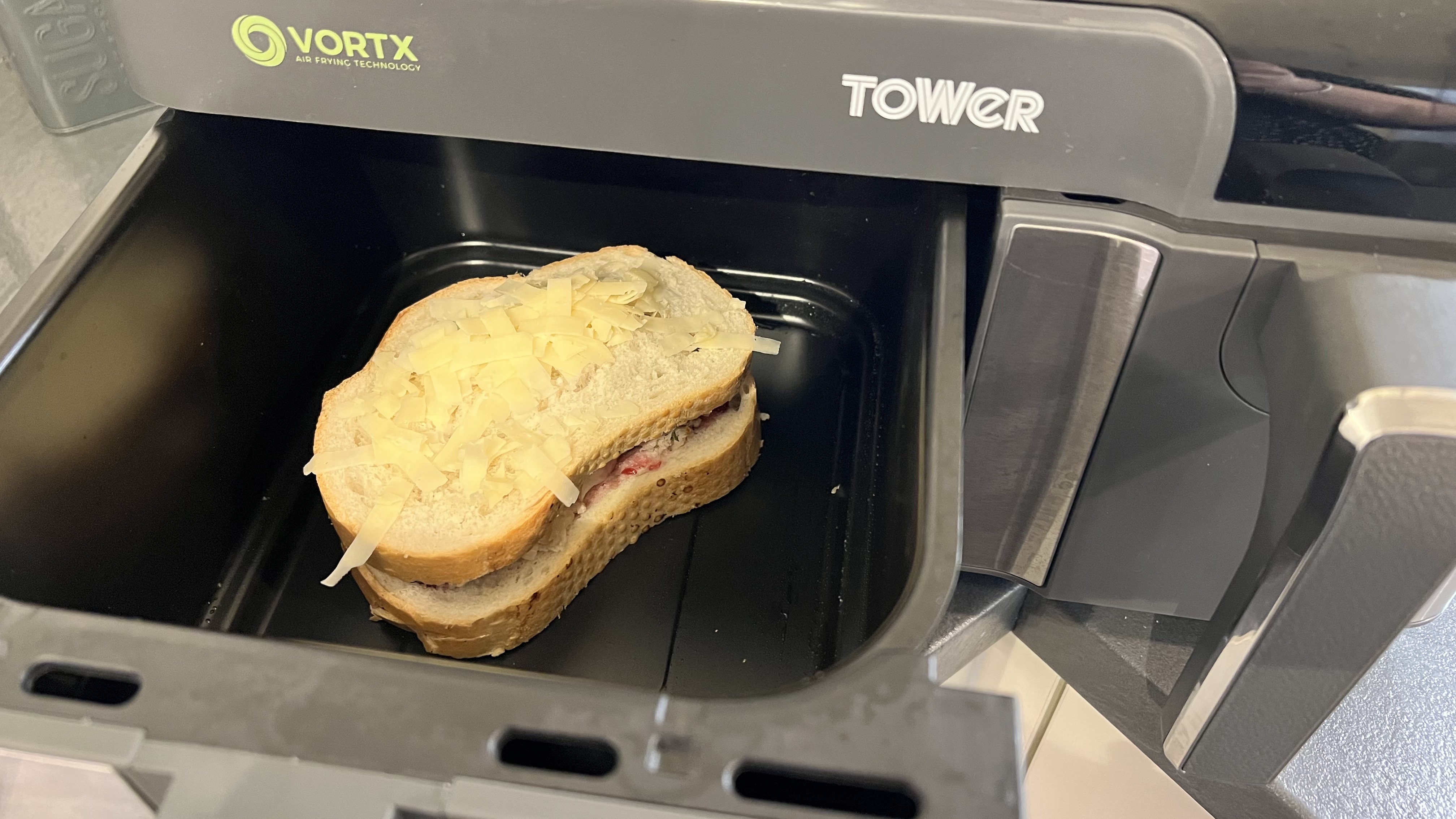 Christmas leftover toastie with cheese on top in an air fryer