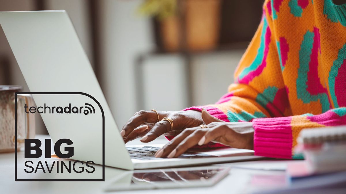 A close up of a woman&#039;s hands typing on a laptop with a badge that says Big Savings at the bottom right.