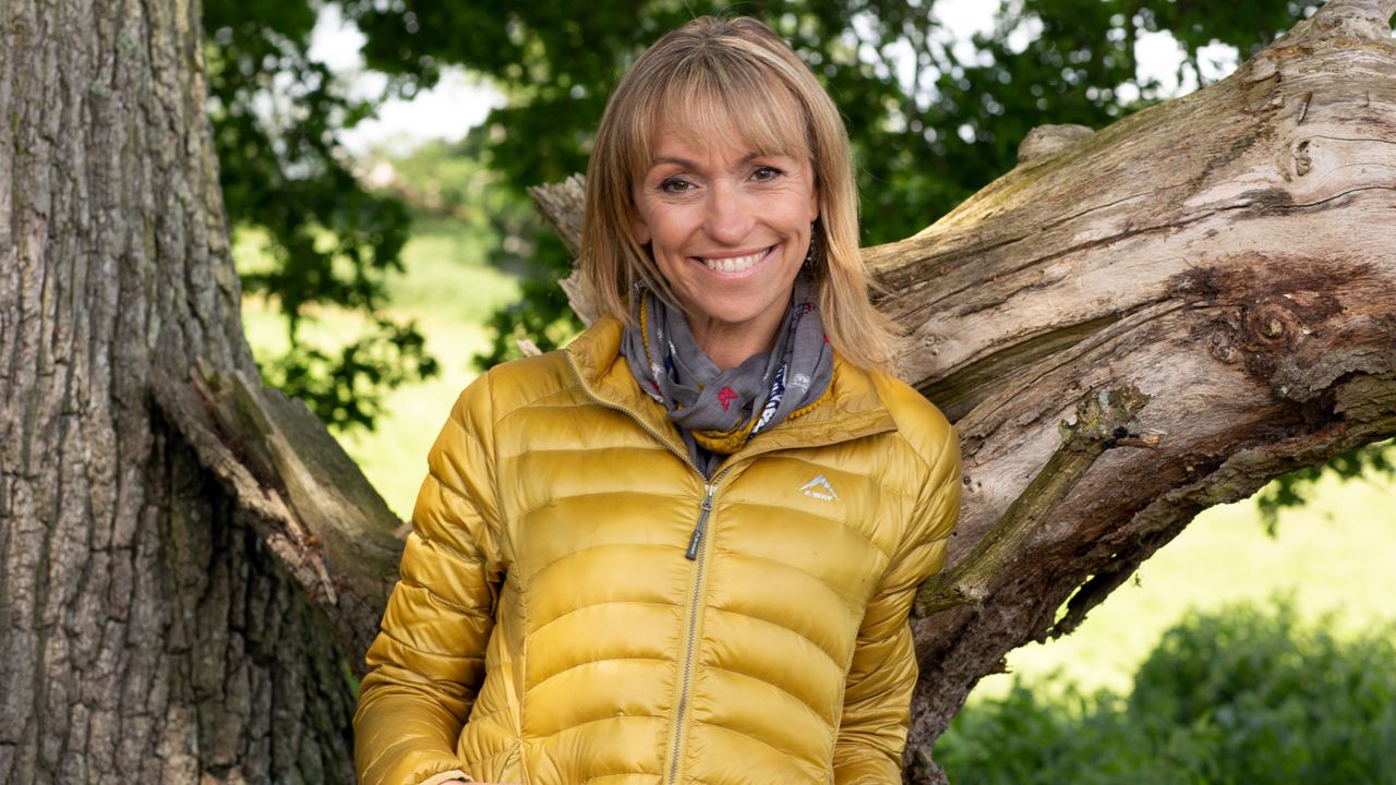 Michaela Strachan in a yellow puffer jacket for Autumnwatch 2022