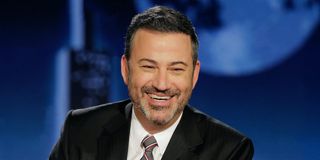 Jimmy Kimmel smiling on his talk show