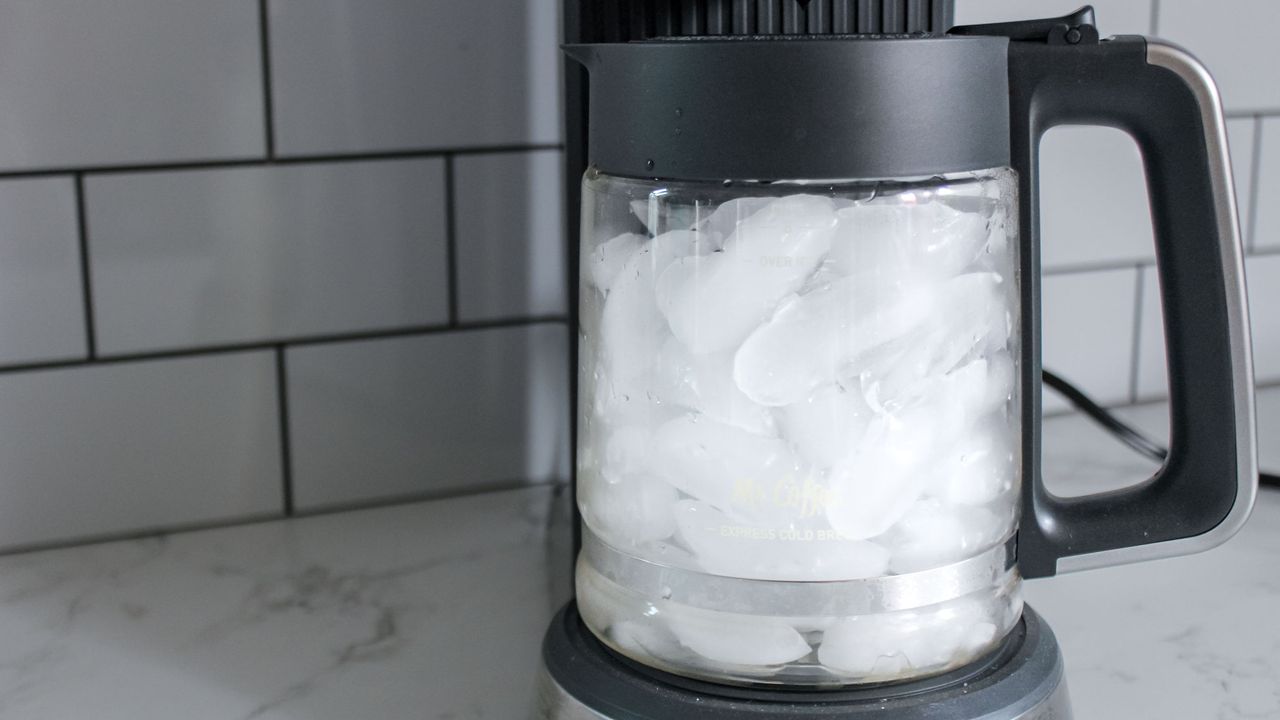 Mr. Coffee Perfect Brew Coffee Maker with a carafe full of ice