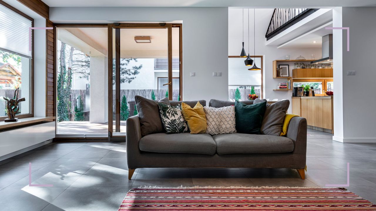 modern living room with tiled floor to support a guide for how to clean tile floors