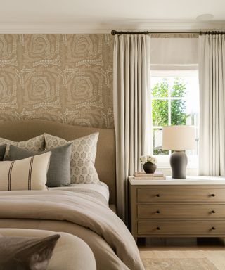 bedroom with neutral scheme and wallpaper