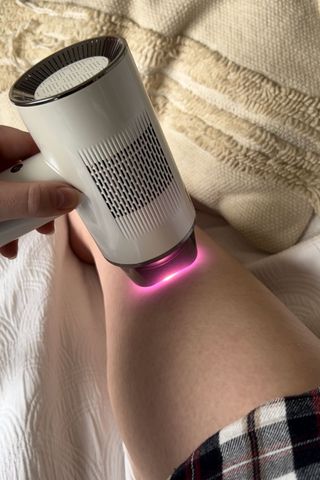Tori Crowther testing the CurrentBody Laser Hair Removal Device on her leg