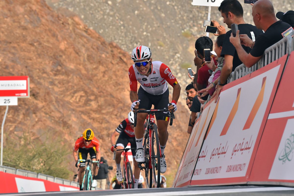 Ewan stands and puts all his power through the pedals