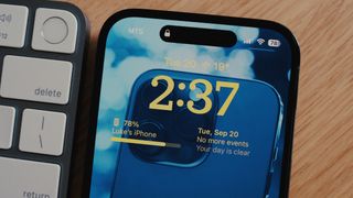 iPhone 14 Pro showing battery percentage on lock screen