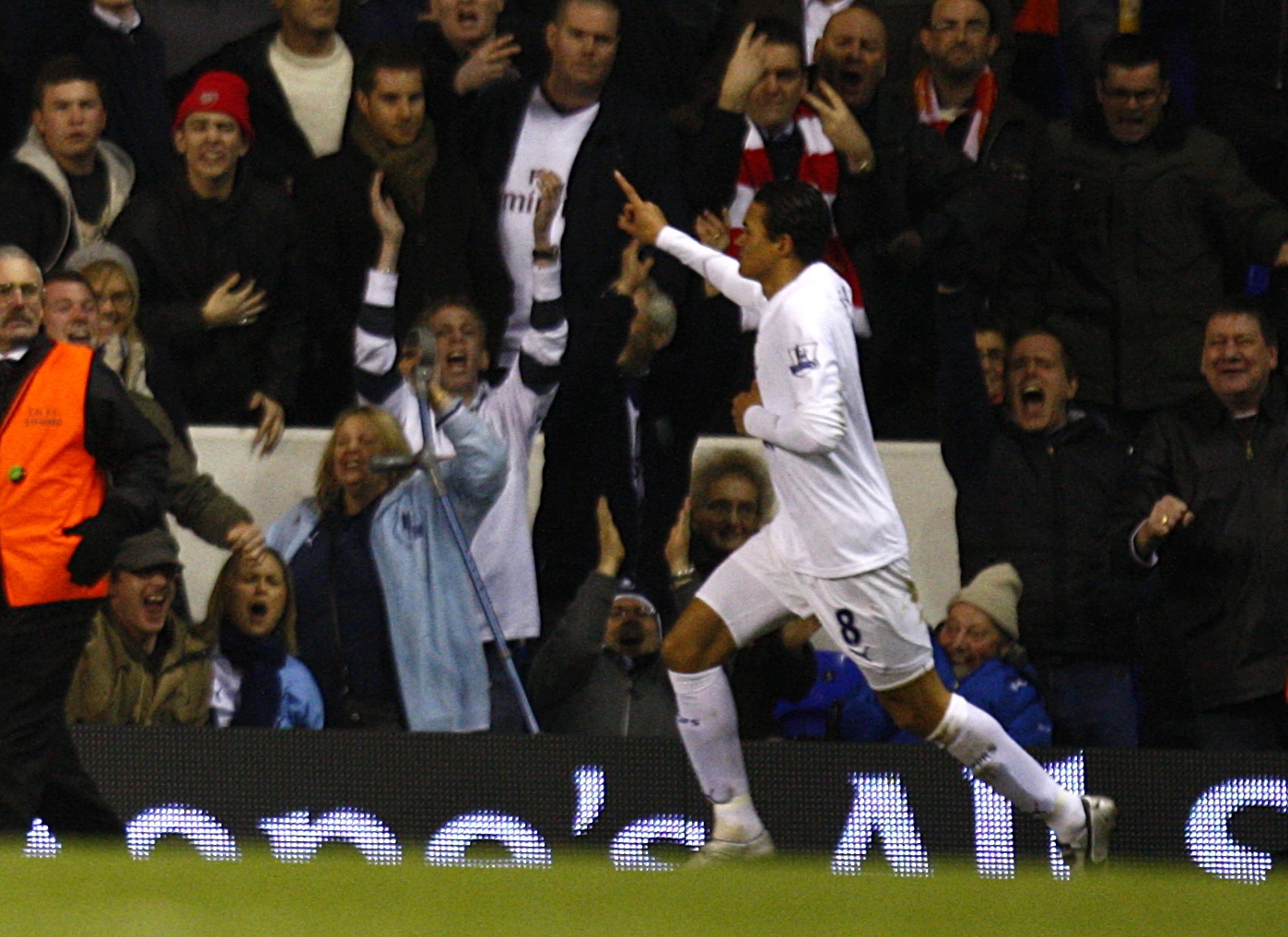 Jermaine Jenas set Tottenham on their way to a resounding League Cup victory over their rivals.
