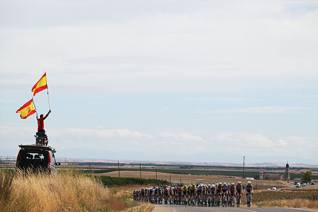 GUIJUELO, SPAIN - SEPTEMBER 12: A general view of the peloton passing through a landscape during the La Vuelta - 80th Tour of Spain 2025, Stage 19 a 161.9km stage from Rueda to Guijuelo/ #UCIWT / on September 12, 2025 in Guijuelo, Spain. (Photo by Dario Belingheri/Getty Images)