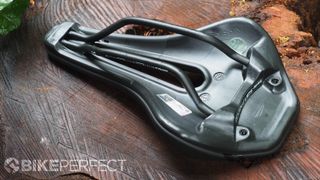 Selle San Marco Ground saddle lying upside down to show the base and rails