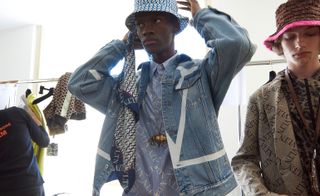Models wear denim and patterned hats at Valentino S/S 2019