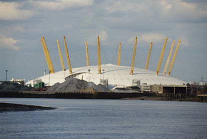 Millenium Dome, designed by Richard Rogers, across the River Thames, Greenwich, 13th February 2000