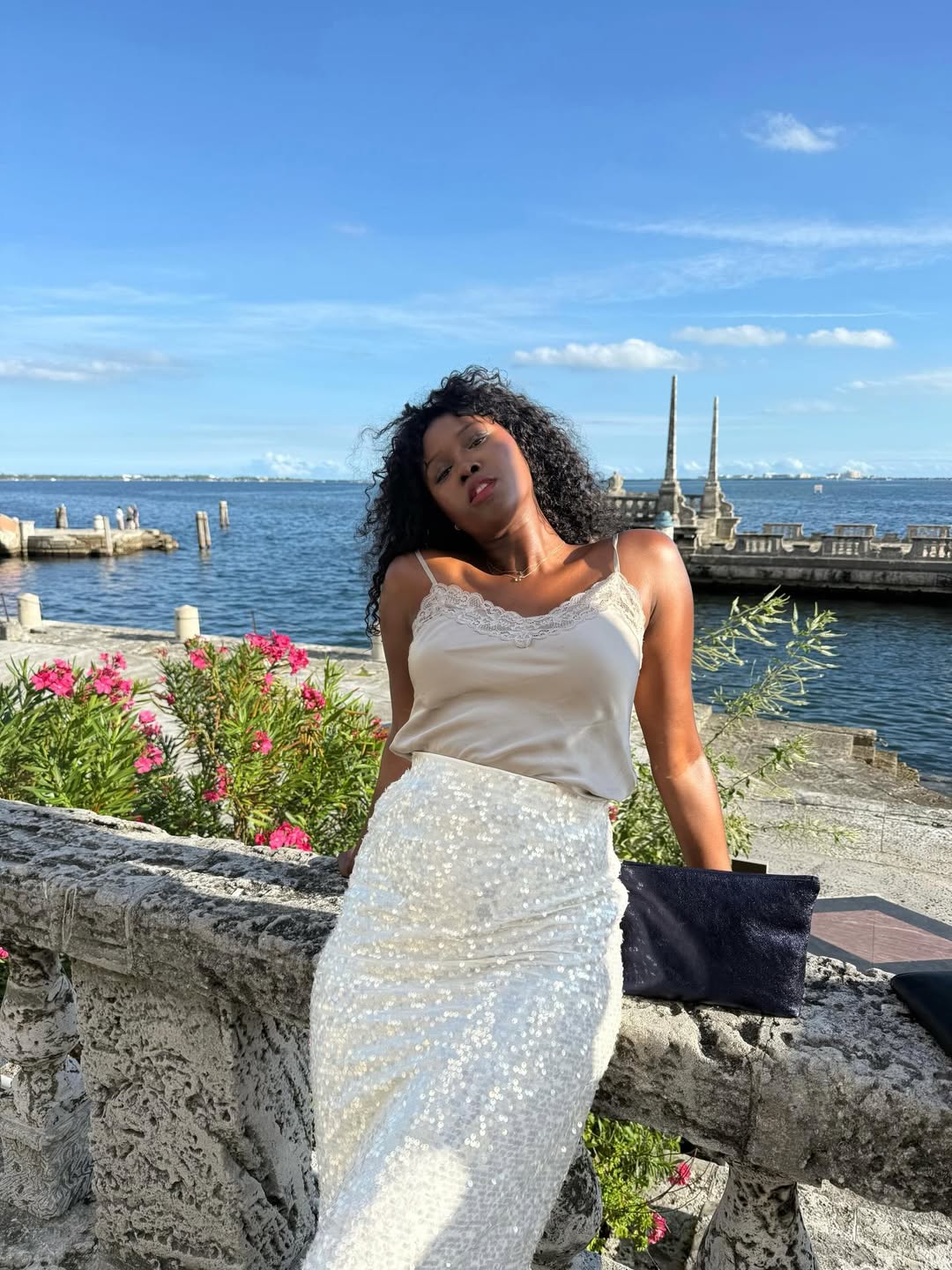 Mali Mollie in a sequin skirt.