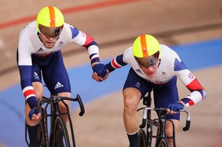 In the Madison, riders perform hand slings to swap in and out of the race