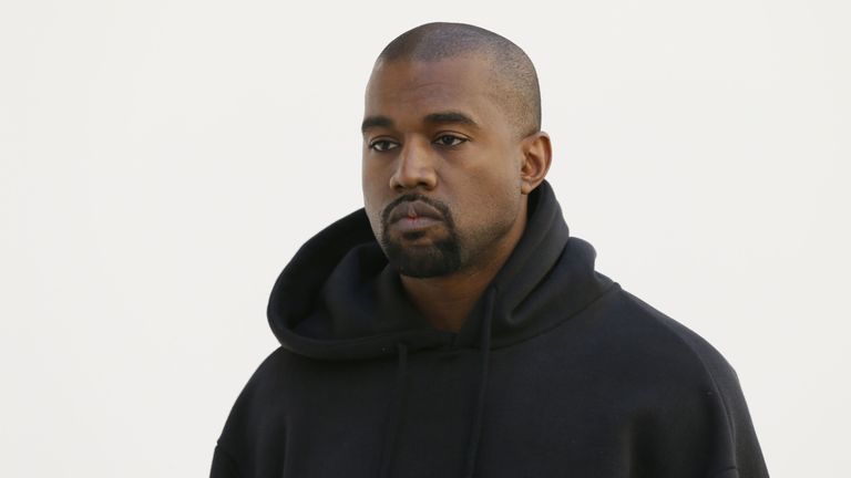 Sleeve, Outerwear, Standing, Facial hair, Collar, Jacket, Sweatshirt, Neck, Hood, Buzz cut,