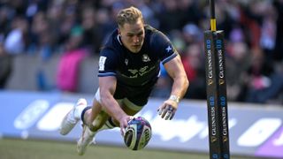 cotland wing Duhan van der Merwe scores a diving try ahead of the Italy vs Scotland Six Nations 2024 match. 