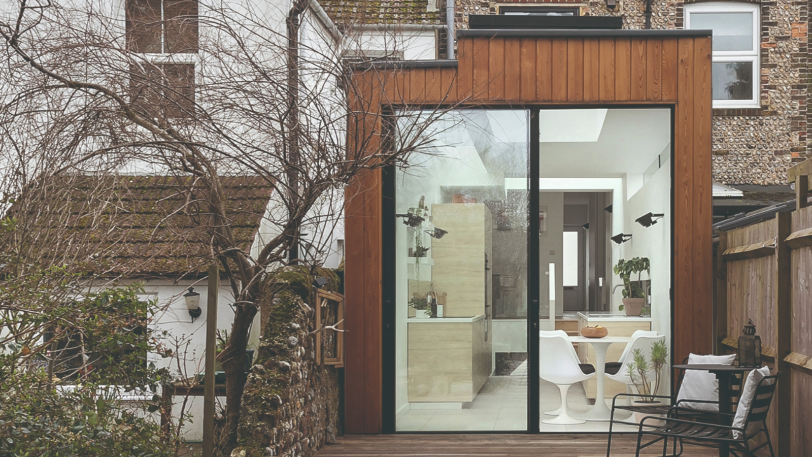 Rear of the property showing the kitchen extension from the garden patio