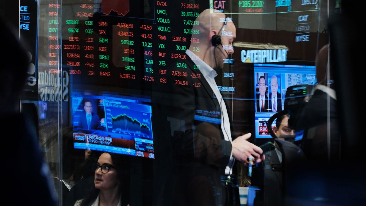 Traders on the floor of the New York Stock Exchange