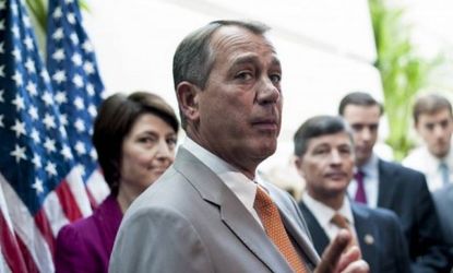 Speaker of the House John Boehner (R-Ohio) answers questions during a press conference on Capitol Hill on June 6: Boehner has vowed to use Republican opposition to the Supreme Court's ObamaCa