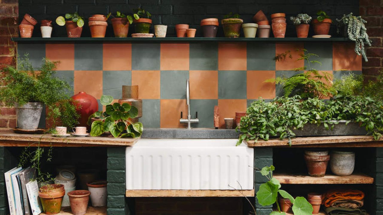 Indoor herb garden with a butler&#039;s sink