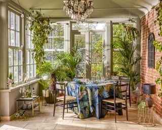 Sunroom dining room idea by Matalan with plants and tropical homeware accessories
