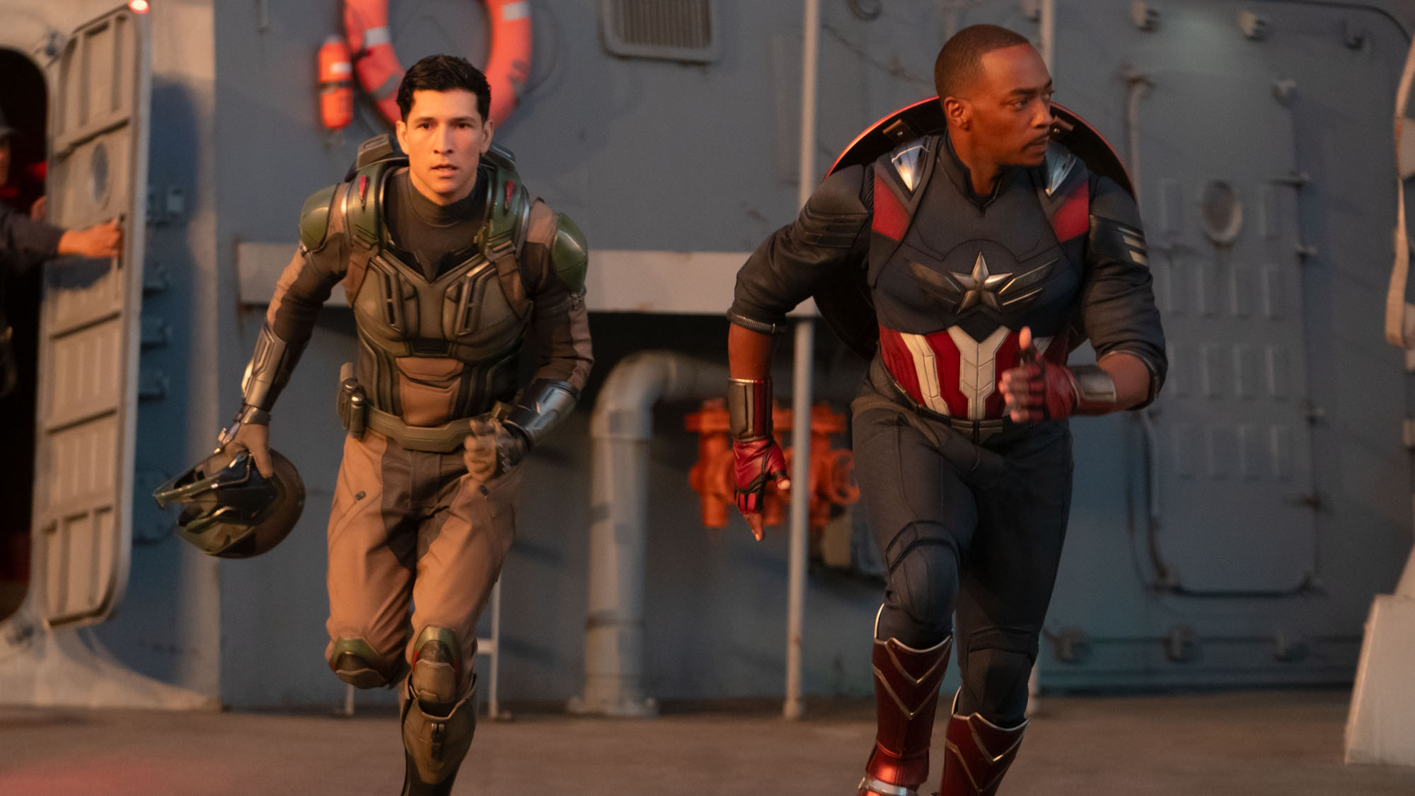 Joaquin Torres (Danny Ramirez) and Sam Wilson (Anthony Mackie) race into action in Captain America: Brave New World.