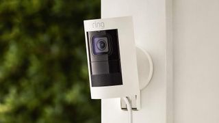 The Ring Stick Up Cam mounted on an exterior wall of a home