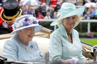 Camilla and the late Queen Elizabeth sat in a carriage