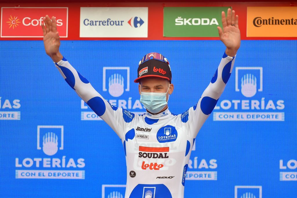 Team Lotto rider Belgiums Tim Wellens sports the Best Climbers jersey as he celebrates on the podium after winning the 5th stage of the 2020 La Vuelta cycling tour of Spain a 1844km race from Huesca to Sabinanigo on October 24 2020 Photo by ANDER GILLENEA AFP Photo by ANDER GILLENEAAFP via Getty Images